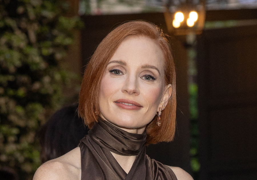 Jessica Chastain with a sleek, structured bob haircut with a deep side part