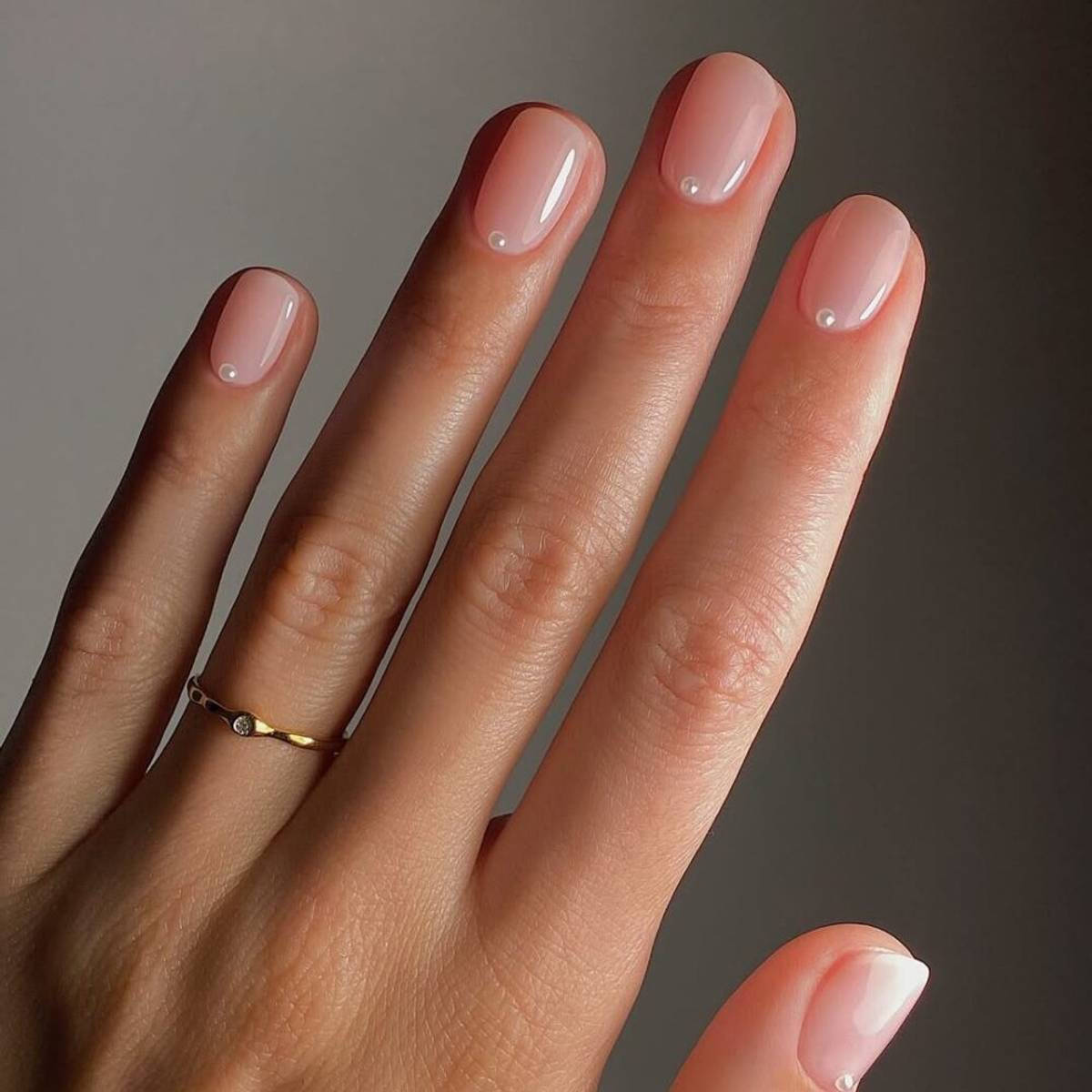 Short nails with clean and natural nail polish