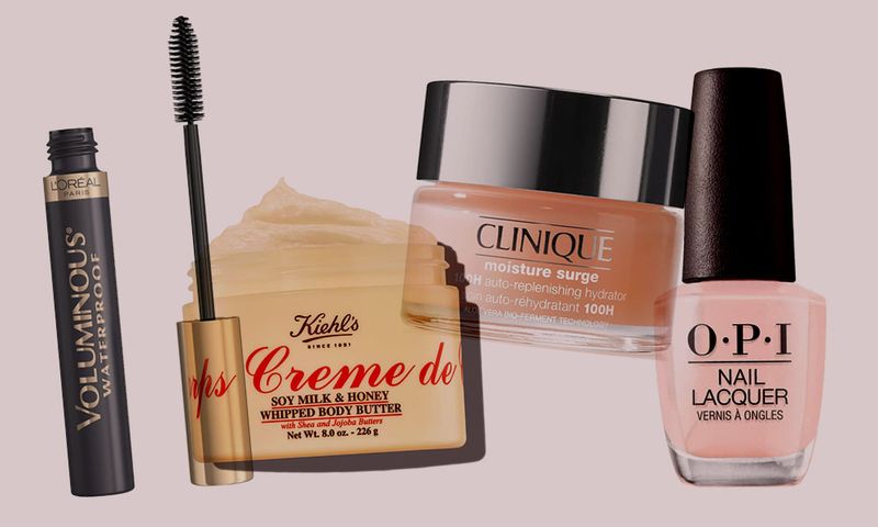 various beauty products from L'Oréal, Kiehl's, Clinique and OPI on light purple background