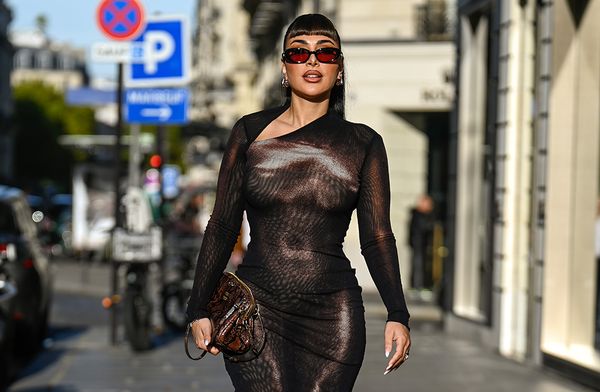 Huda Kattan is seen wearing a Jean Paul Gaultier dress, Miu Miu bag, Gentle Monster sunglasses and Maria Black earrings during the Womenswear Spring Summer 2026 as part of Paris Fashion Week on October 07, 2025 in Paris, France.