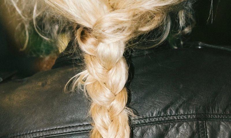back view of blonde hair in a braid