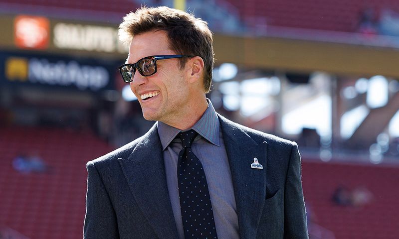 SANTA CLARA, CALIFORNIA - NOVEMBER 9: Fox Sports lead analyst Tom Brady stands on the field prior to an NFL football game between the Los Angeles Rams and the San Francisco 49ers at Levi's Stadium on November 09, 2025 in Santa Clara, California. (Photo by Brooke Sutton/Getty Images)