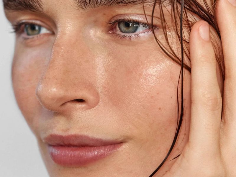 woman wearing True Botanicals face oil