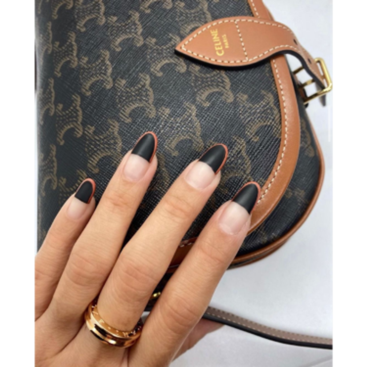 close up of black matte nail design