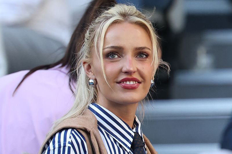 Morgan Riddle, girlfriend of Taylor Fritz of the United States, is seen in the stand prior to the Men's Singles Second Round against Vit Kopriva of the Czech Republic during day five of the 2026 Australian Open at Melbourne Park on January 22, 2026 in Melbourne, Australia.