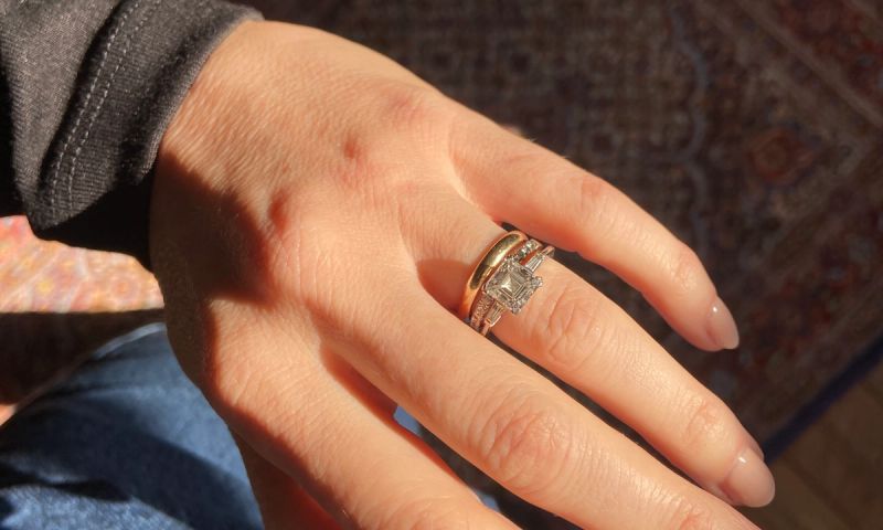 hand with rings on ring finger