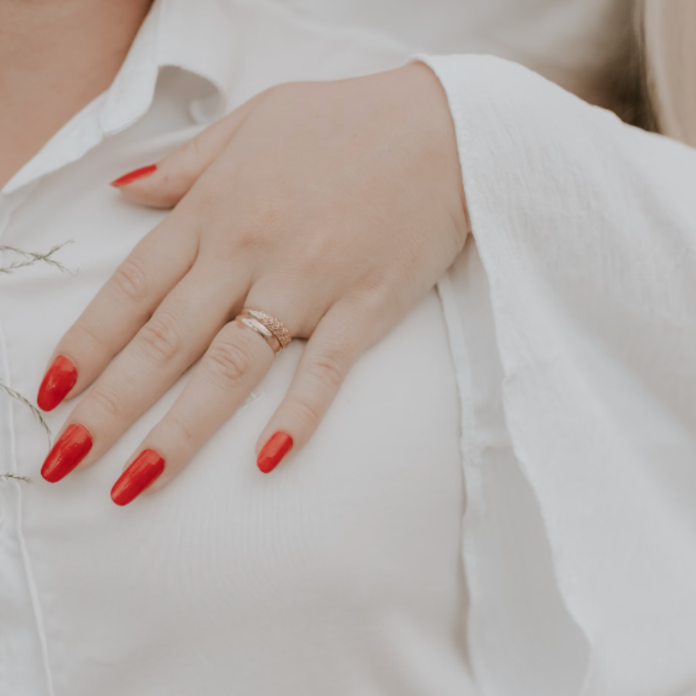 Unsplash by Alexander Mass red bridal nails