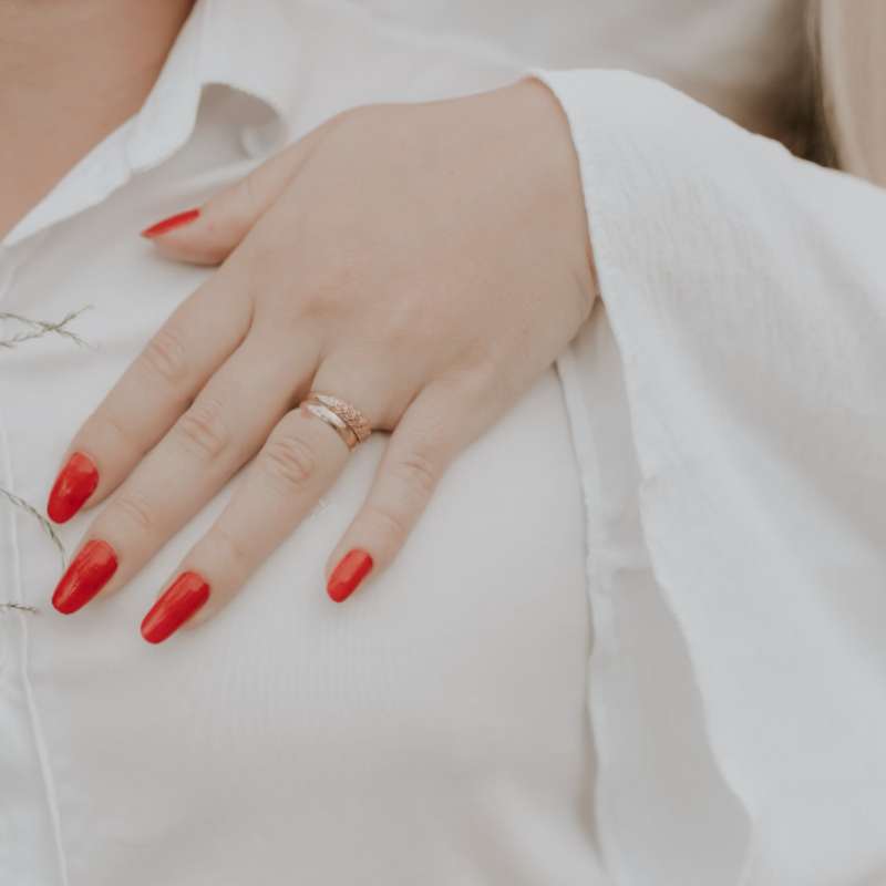 Unsplash by Alexander Mass red bridal nails