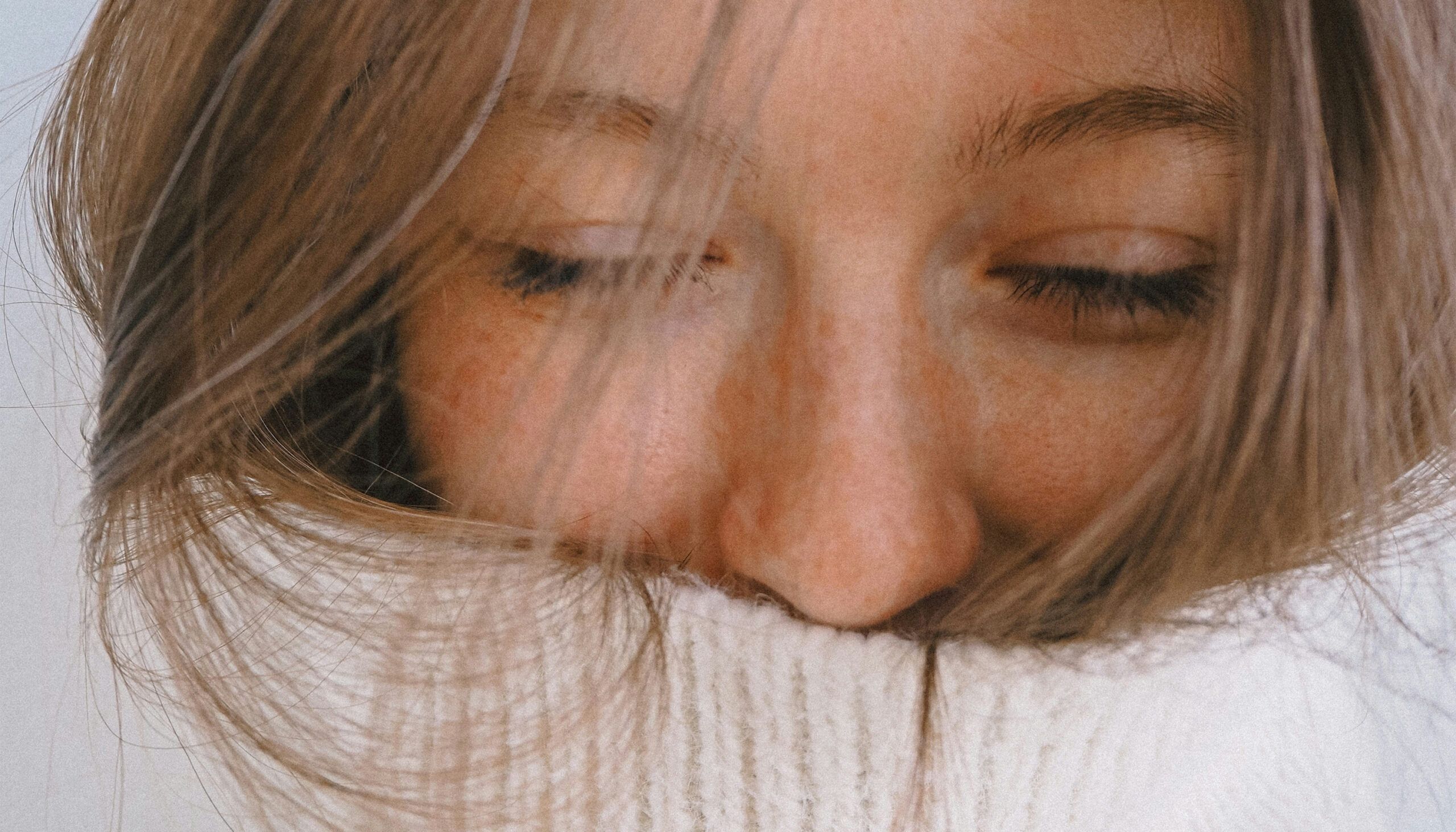 woman in a turtleneck