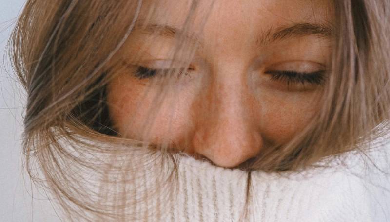 woman in a turtleneck