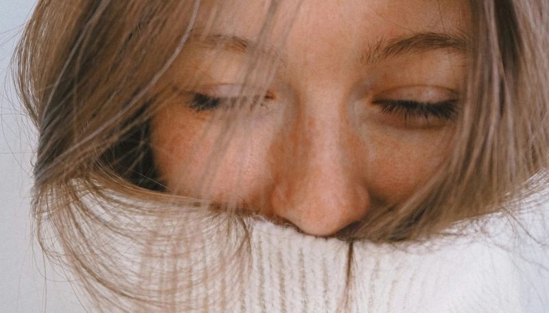 woman in a turtleneck