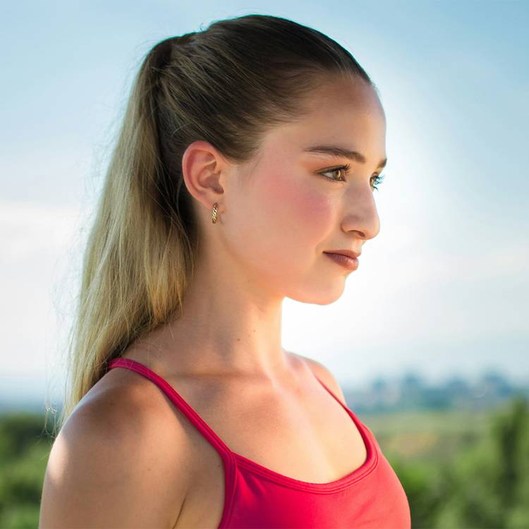 Girl with slick-back ponytail