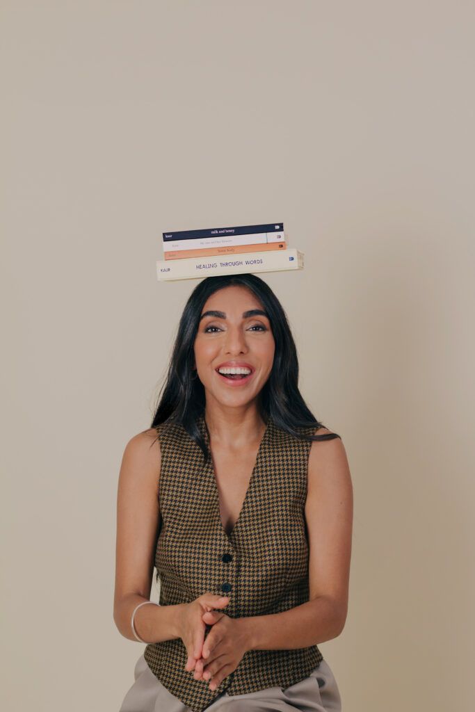 Rupi Kaur with her published books