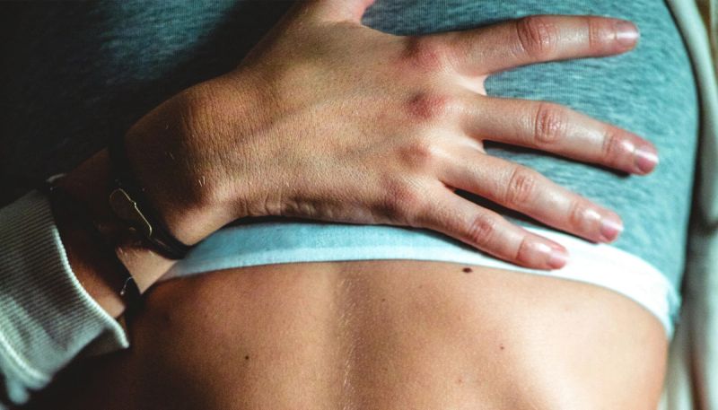 woman with breast pain