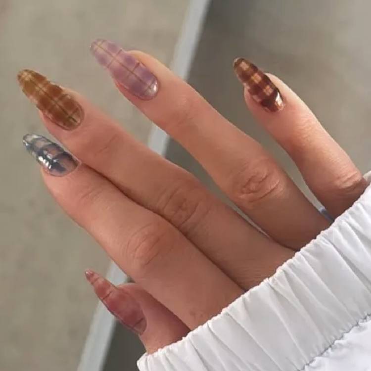 Kylie Jenner's plaid nails for fall by celebrity manicurist Zola Ganzorigt