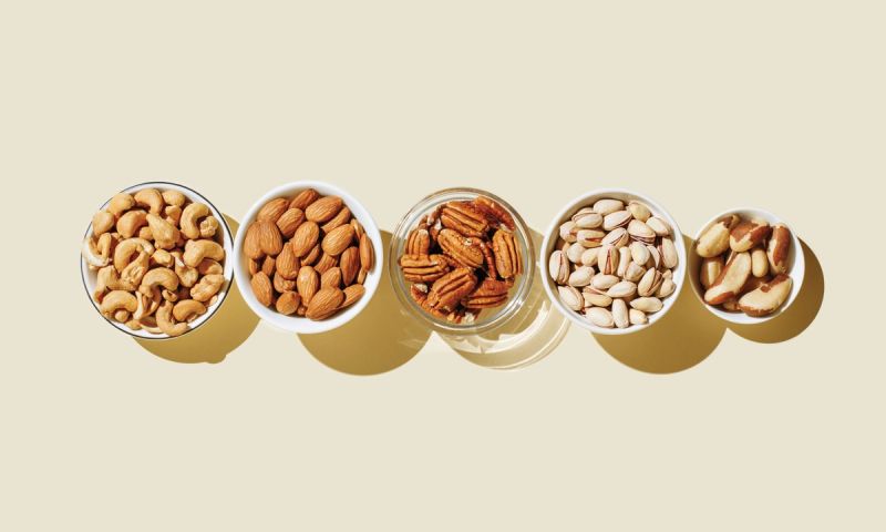 bowl of nuts on beige background