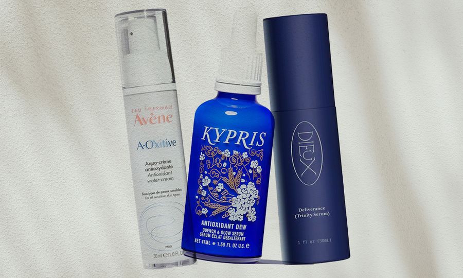 various antooxidant serums on shadow background