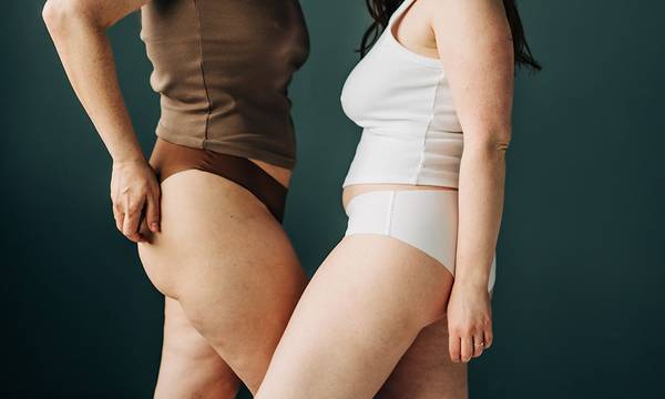 Two females in lingerie with different body shape.