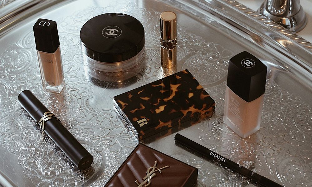 various makeup on silver tray