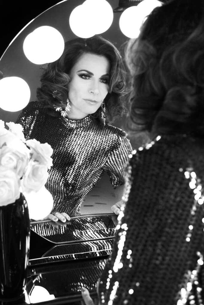 Luann de Lesseps looking in mirror