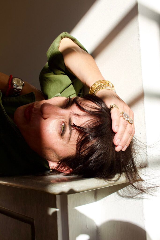 Constance Zimmer face in shadow