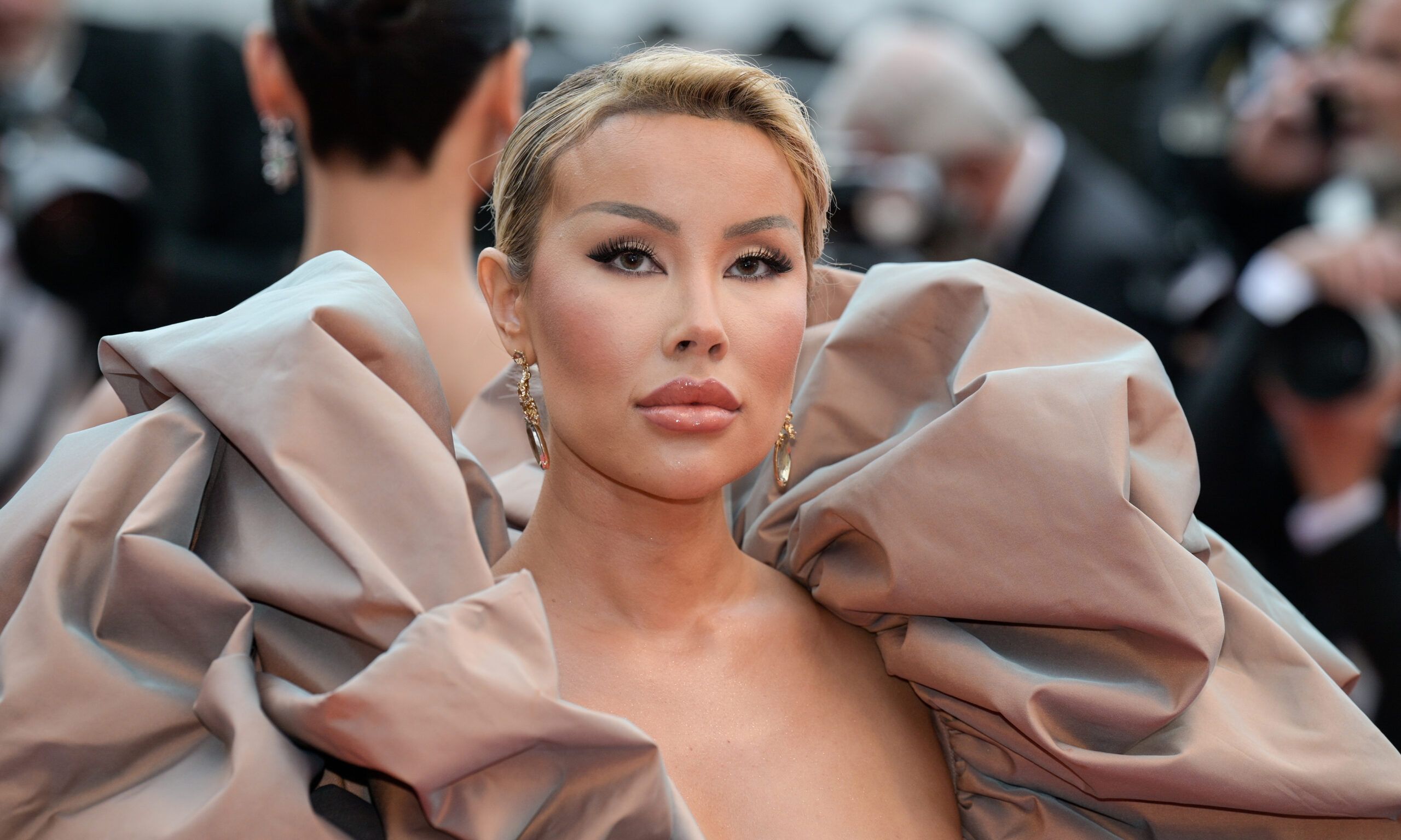 Lisa Opie poses on Cannes red carpet