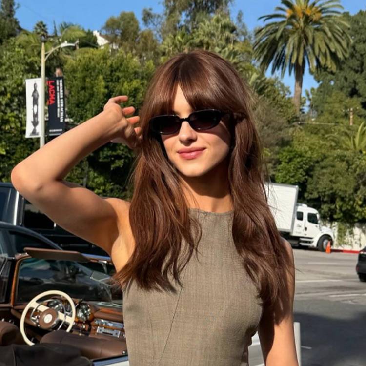 Daisy Edgar-Jones with strawberry brunette hair