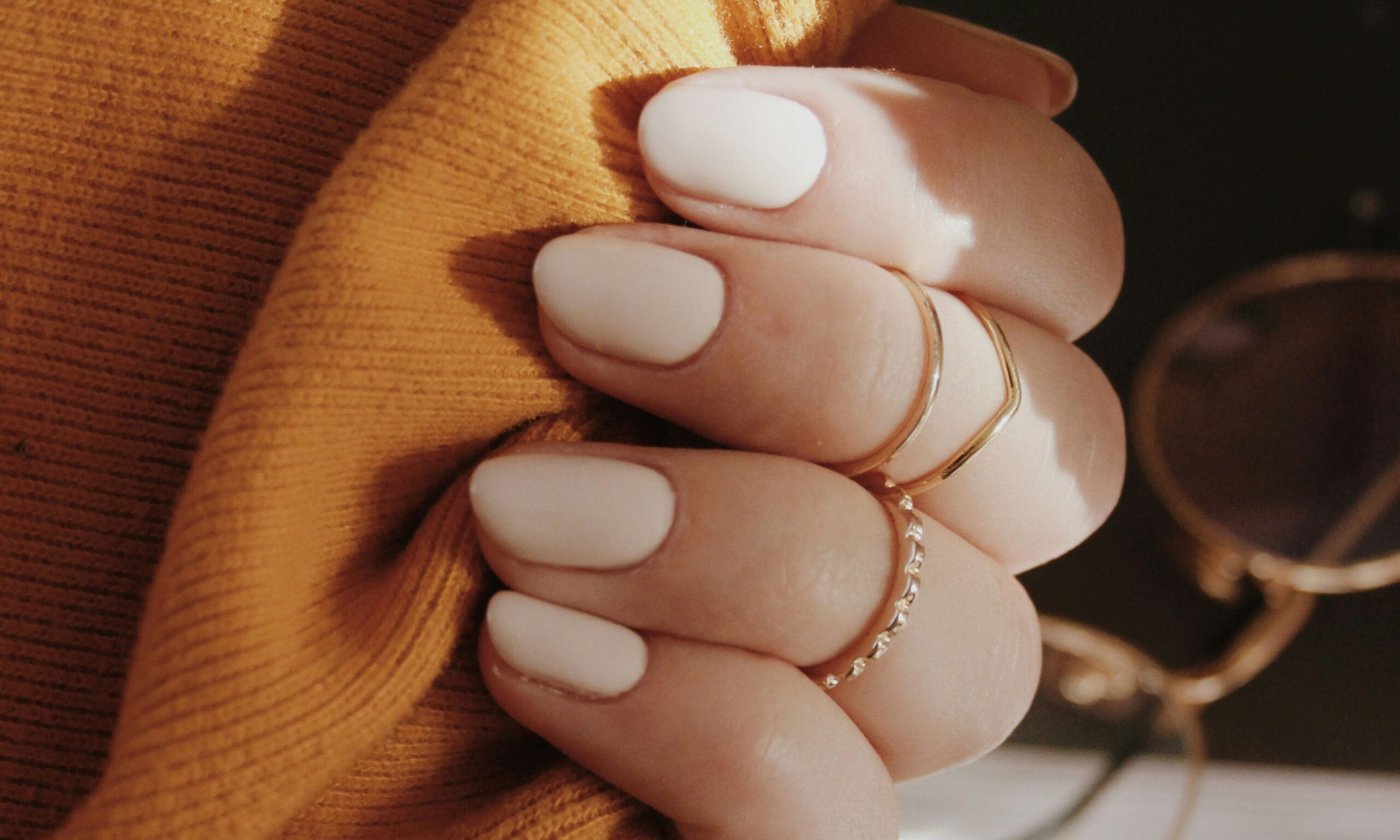beige nail polish manicure