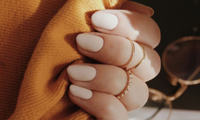 beige nail polish manicure