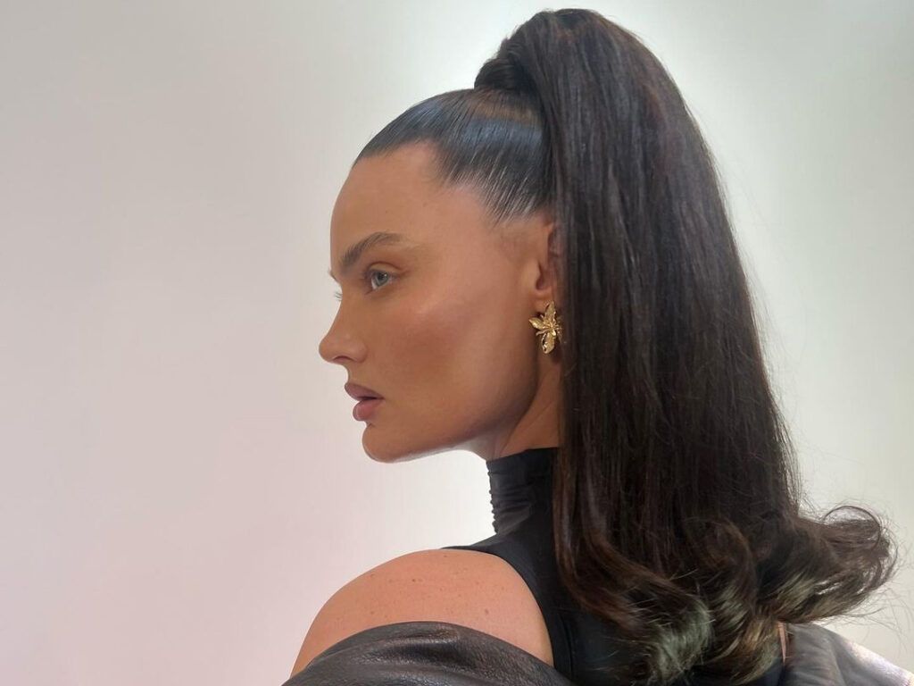 woman with high voluminous ponytail hairstyle