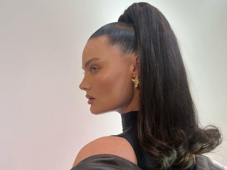 woman with high voluminous ponytail hairstyle