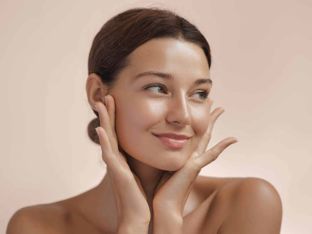 woman with hands on cheeks