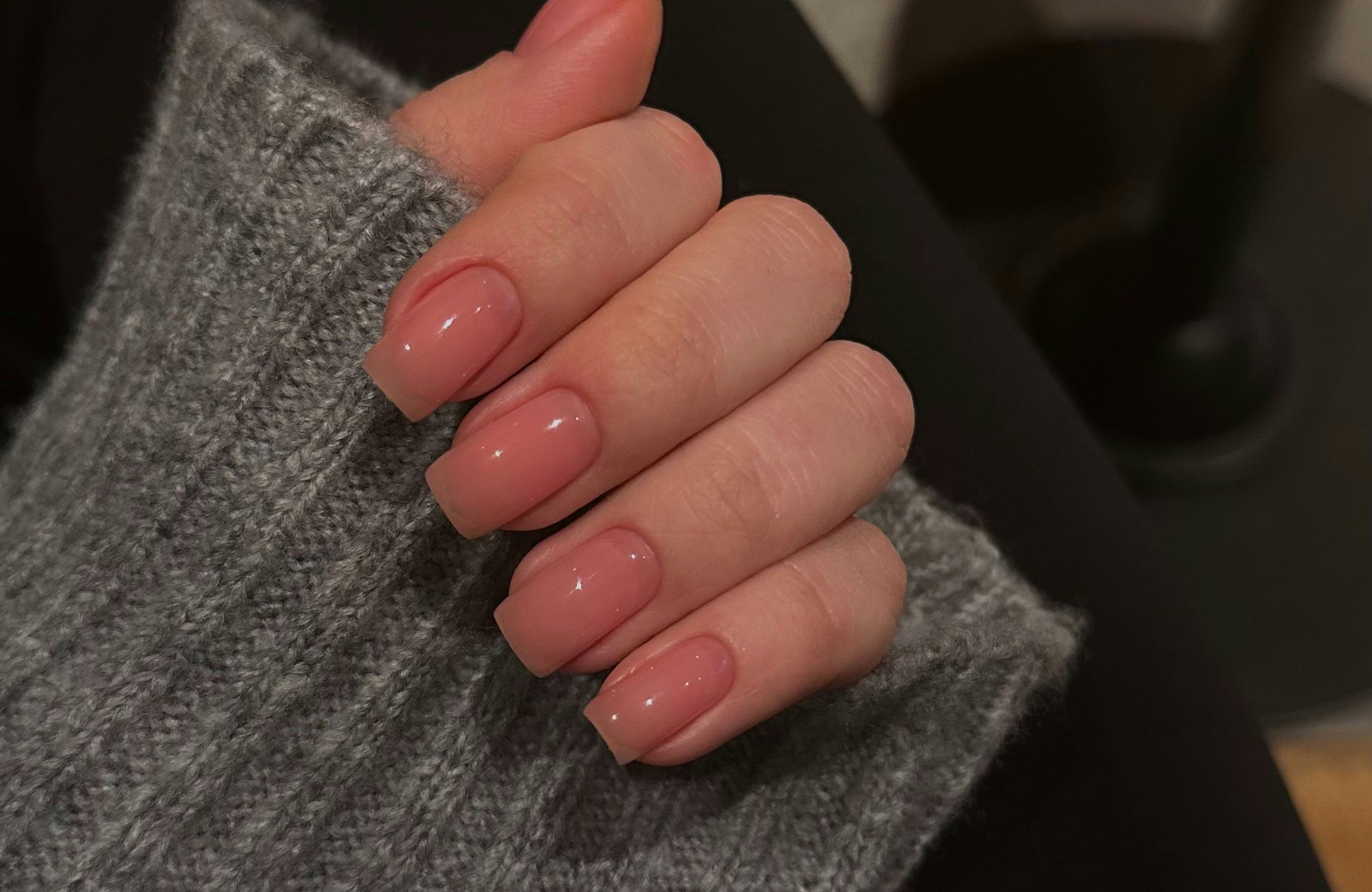 woman's glossy nails