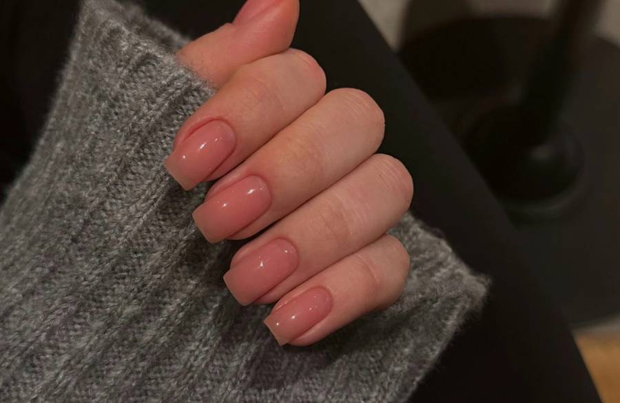 woman's glossy nails