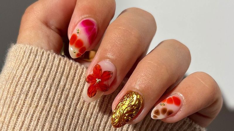 floral and gold nail art manicure
