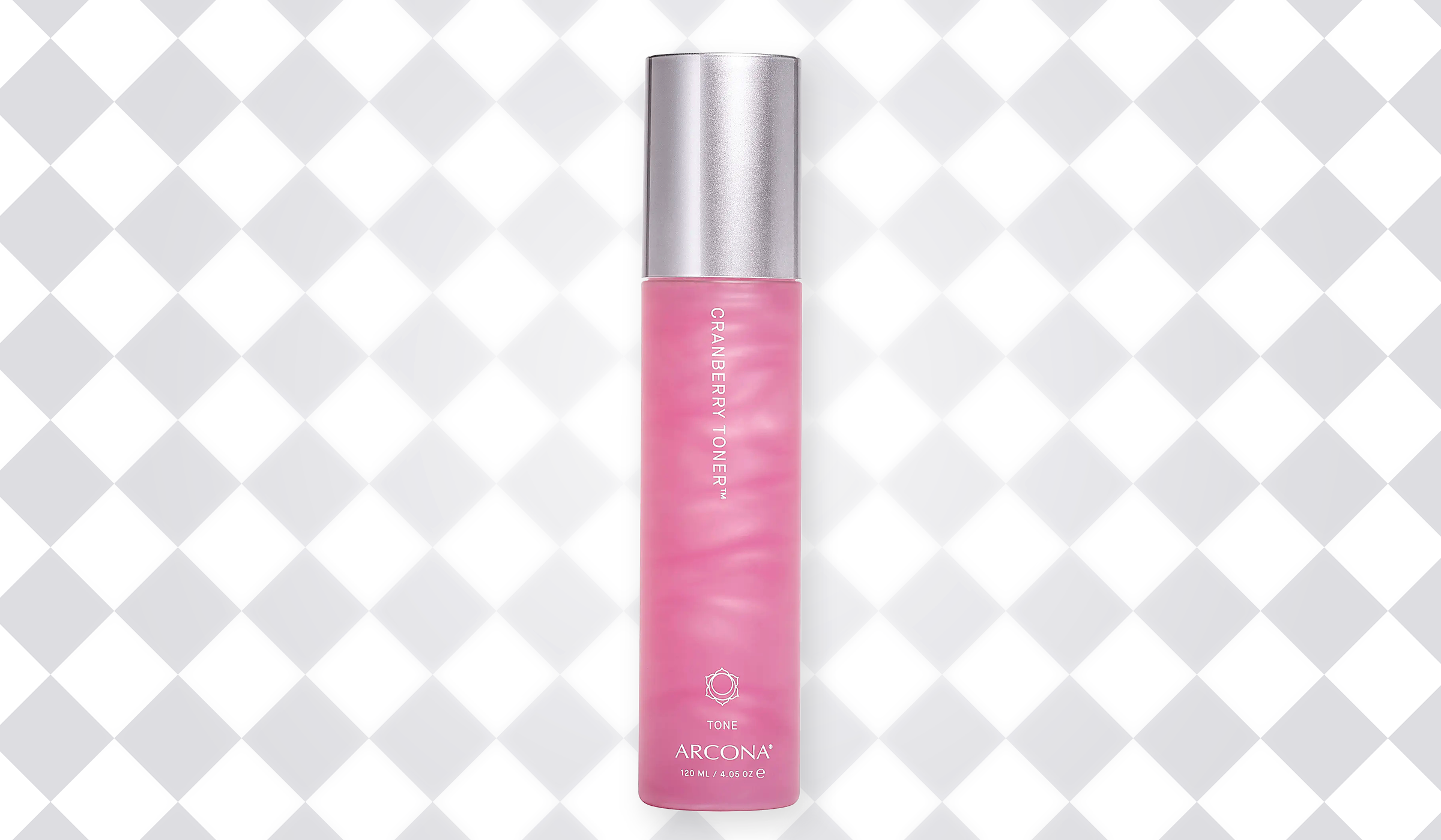 Pink bottle of ARCONA Cranberry Toner with a silver cap against a white-and-gray diamond-patterned background.