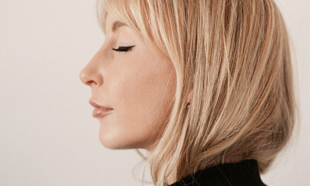 side profile of blonde haired woman
