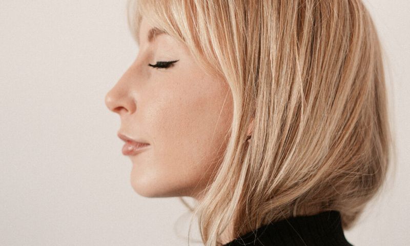 side profile of blonde haired woman
