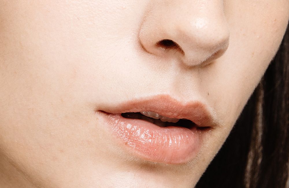 Here’s What You Need to Know About Lip-Lightening Treatments