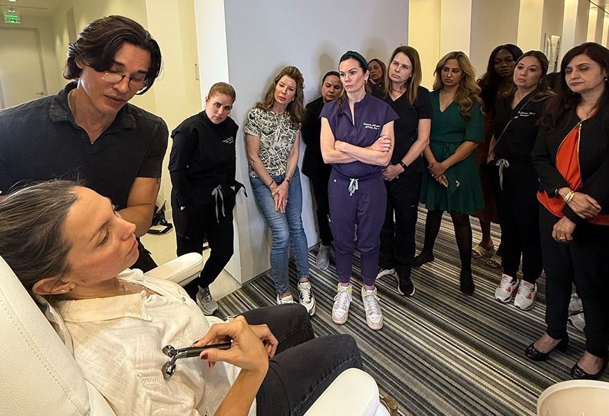 Dr. Shino Bay Aguilera shares his expertise during advanced training at Platinum Dermatology Partners in Miami.