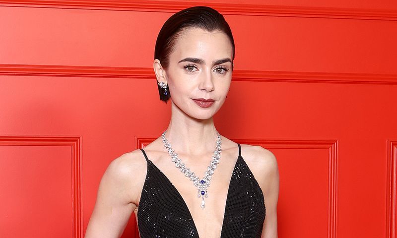 PARIS, FRANCE - DECEMBER 15: Lily Collins attends the "Emily In Paris" - Season Five - Netflix Paris Premiere at Le Grand Rex on December 15, 2025 in Paris, France.