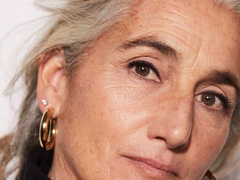 older woman wearing black eyeliner