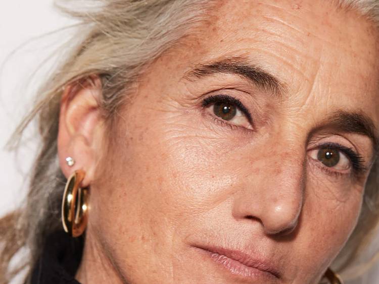 older woman wearing black eyeliner
