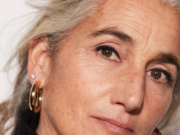 older woman wearing black eyeliner