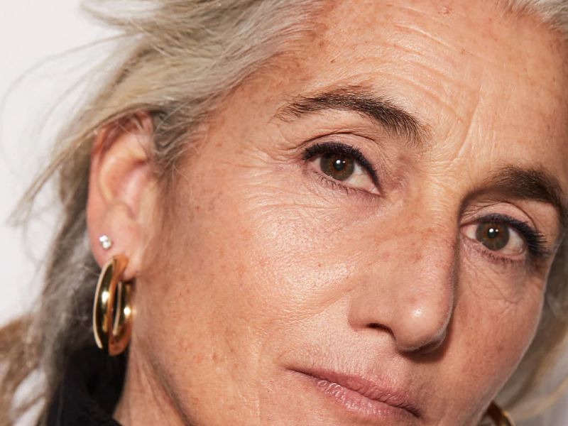 older woman wearing black eyeliner