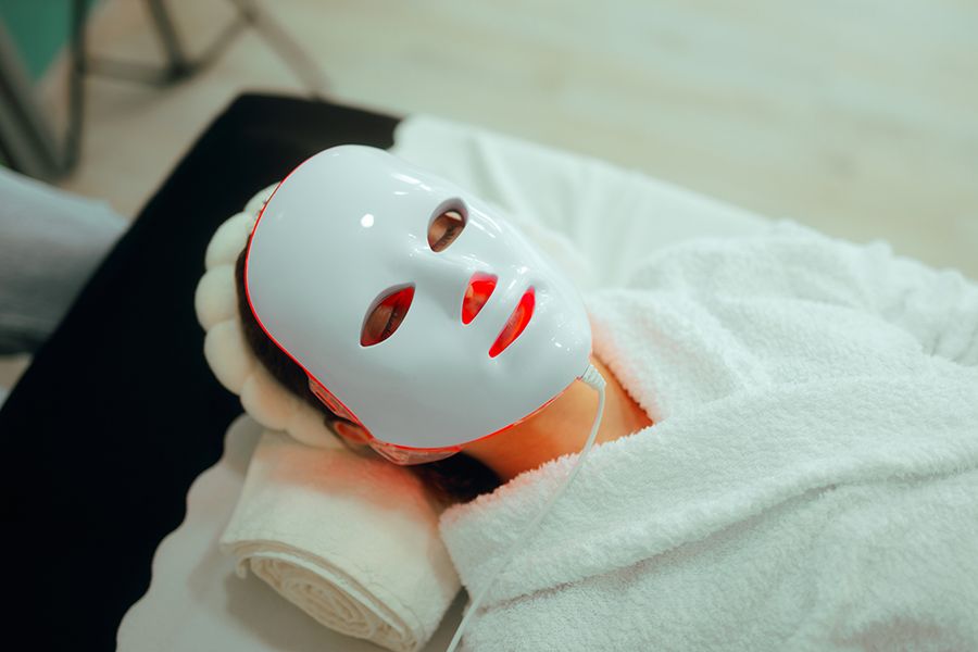 Lady using professional services in a beauty salon for skin care