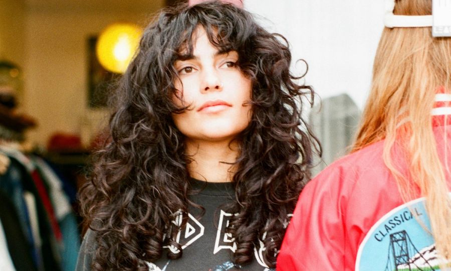 young woman with curly hair