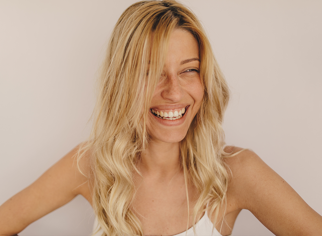 blonde woman laughing