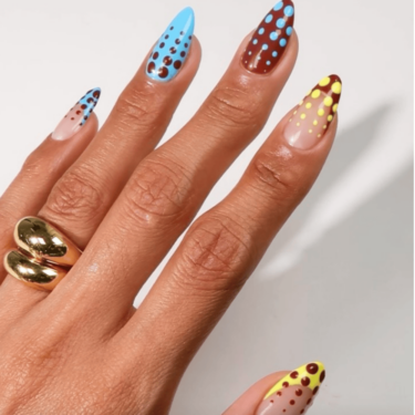 Polka dot nails with bold colors
