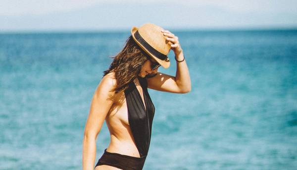 woman with side boob on the beach